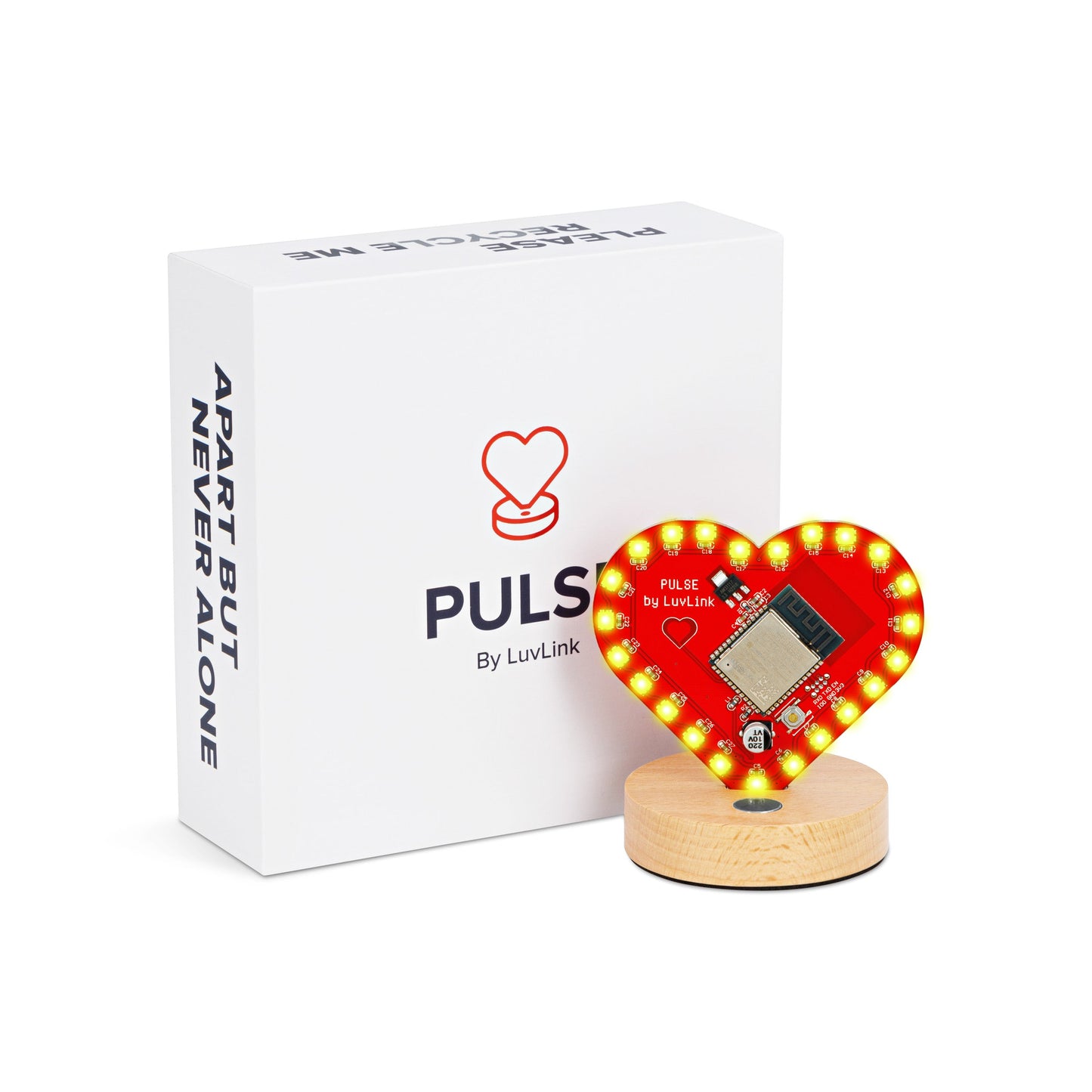 Glowing red heart-shaped lamp on a natural wood stand displayed with its branded white box.