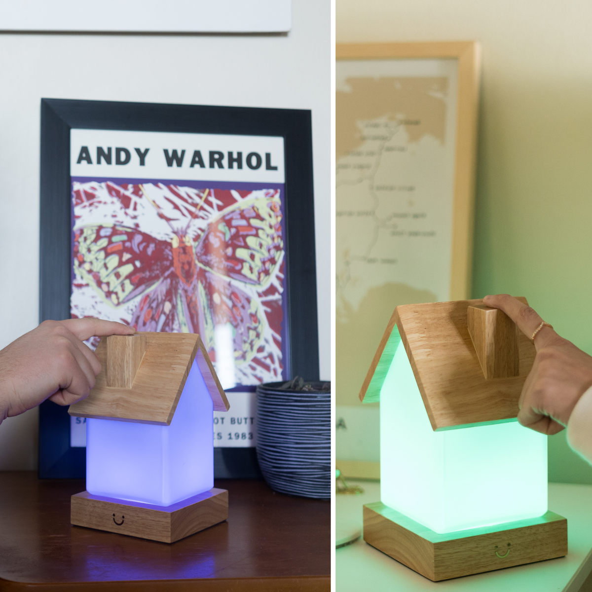 Illuminated fabric-shade lamp with wooden base shown in blue and green beside art and décor.