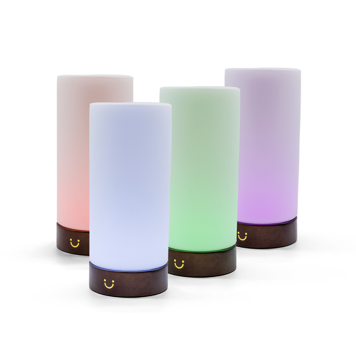 Soft-glowing friendship lamps in pink, blue, green and purple sit atop wooden bases with gold detailing.