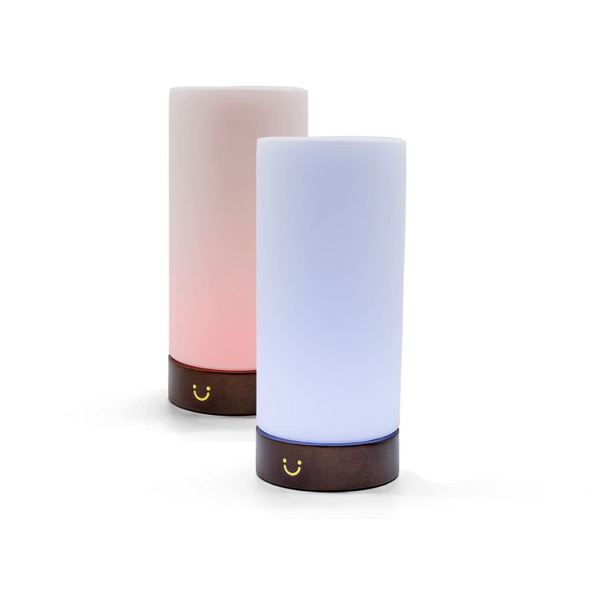 Glowing pink and blue cylindrical lamps with timber bases positioned together.