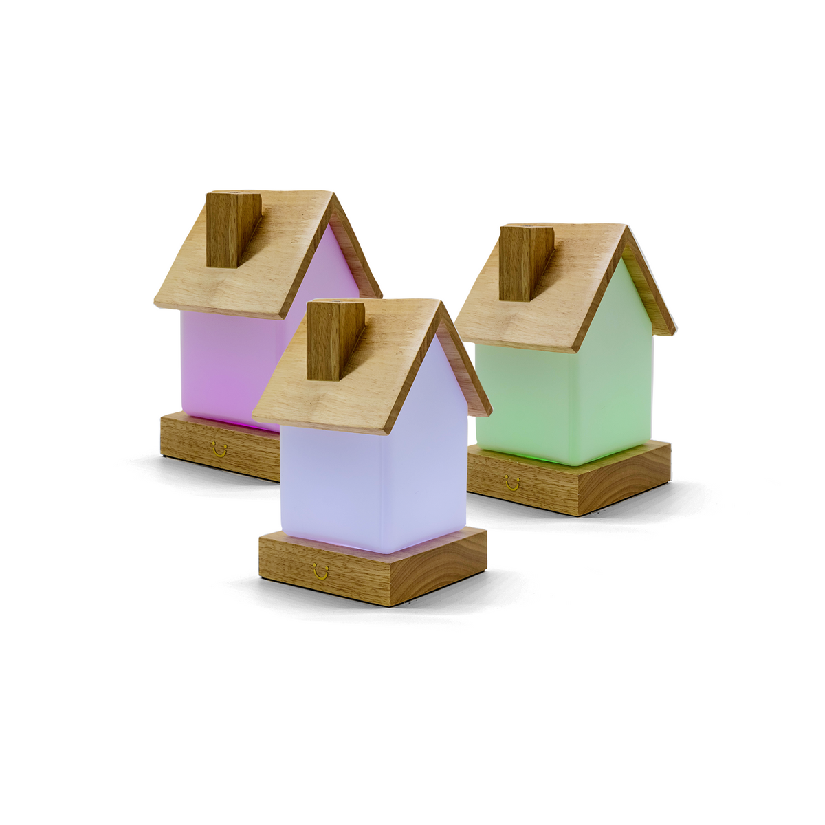 Friendship lamps in pastel purple, lavender and mint feature wooden pitched roofs and bases.