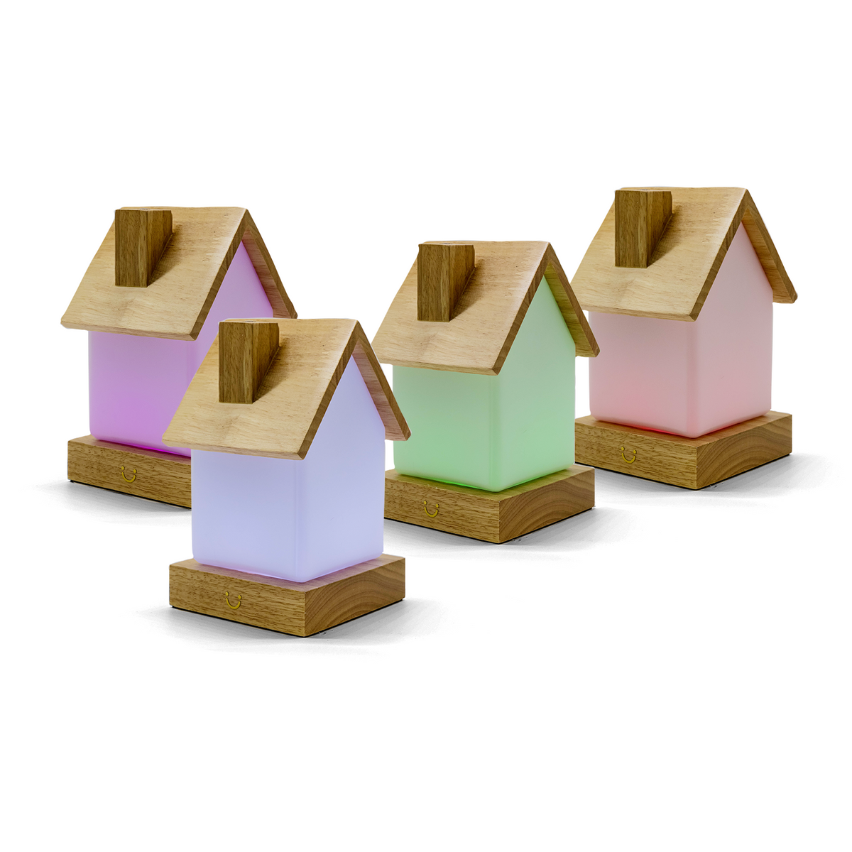 Glowing friendship lamps with pastel bases and wooden roofs displayed in a row of four colours.